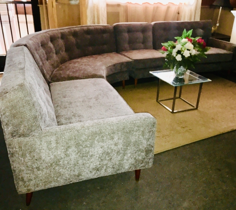 Classic House - Phoenix, AZ. This beautiful vintage sectional sofa has been custom reupholstered by our shop, Classic House.
