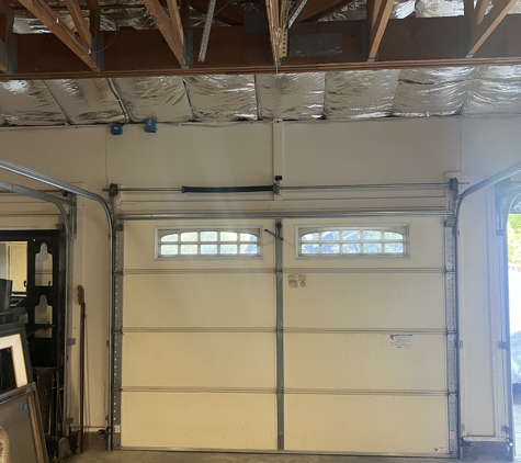 Palms Garage Doors - San Jose, CA. Our expert team ensures a smooth transition to advanced garage door openers, setting new standards in Pinecrest Drive,San Martin, California