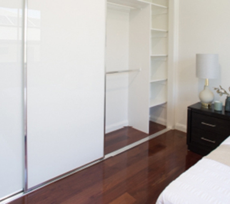 Bradnam's Windows & Doors - Urraween, QLD. Sliding Wardrobe Door In Bedroom