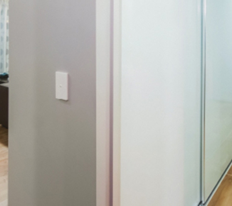 Bradnam's Windows & Doors - Urraween, QLD. Sliding Wardrobe Door In Hallway
