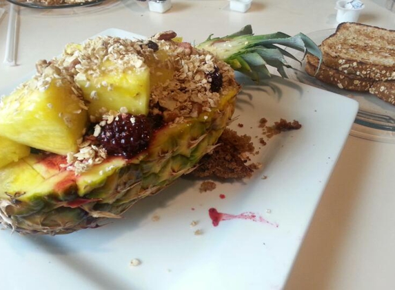 Childers Eatery - Peoria, IL. fruit platter served in a half pineapple!  delish!