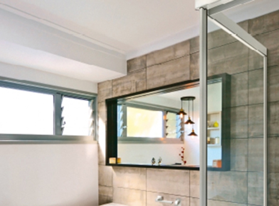 Bradnam's Windows & Doors - Mount St John, QLD. White Sliding Shower Screen