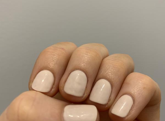 Pearl Nails - East Maitland, NSW. Uneven coat and bumps and ridges, due to base coat not being applied correctly.