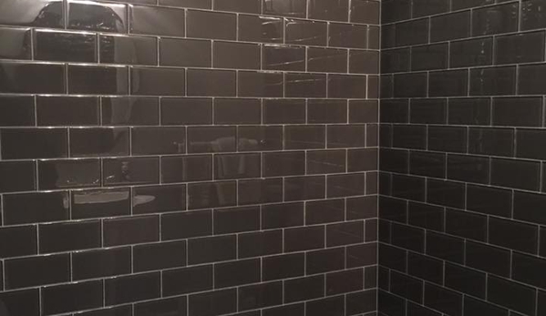 Meyer Floors - Saint Joseph, MO. Shower walls with 3x6 glass tile