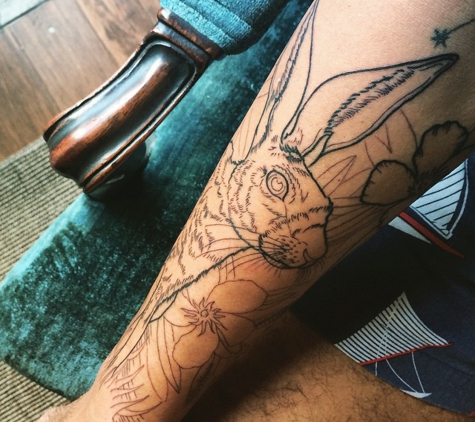 Evermore Tattoo - Los Angeles, CA. Jackrabbit half-sleeve after first session. Done by Amanda Marie.