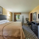 Super 8 by Wyndham Higginsville - Motels