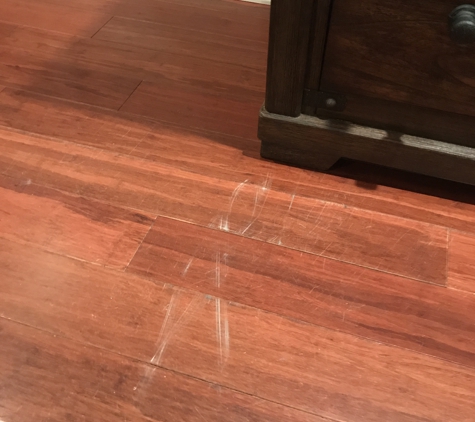 East Carolina Moving, LLC. Floor scratched by movers