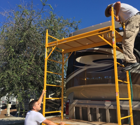 Bottoms Up Cleaning & Detailing LLC - Panama City, FL. Cleaning the roof of a large RV