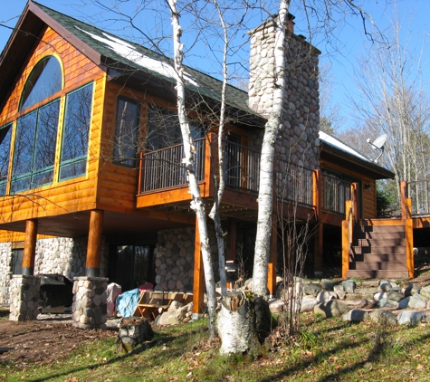 The Lakewood Companies, Inc. - Arbor Vitae, WI. After adding 9 feet to great room.  Built deck to side with sliding doors.