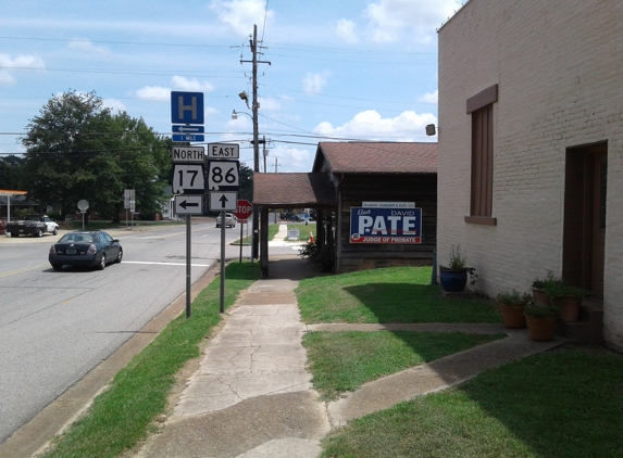 Pate, David H, ATY - Carrollton, AL. Other side of the building and visible from the road, pic shows you that it's right beside hwy- 86. And the Turn for hwy-17 is just across from the business.