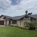 McKinnis Roofing & Sheet Metal of Florida - Gutters & Downspouts