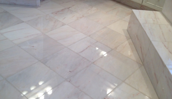 Da Vinci Stone Restoration - Branford, CT. Polished onyx bathroom floor.