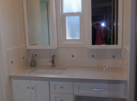 Joe Torres Cabinet Shop - Modesto, CA. Master bath vanity with medicine cabinets and new window.