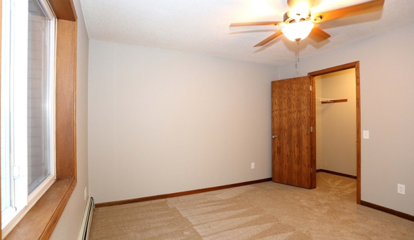 Springwood Apartments - Forest Lake, MN. Master Bedroom