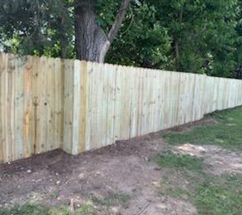 Williams Fence LLC - West Plains, MO. 6 ft wood privacy boxing around trees