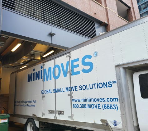 MiniMoves Inc - Hillside, IL. MiniMoves Inc. truck in city building