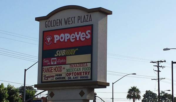Popeyes Louisiana Kitchen - El Monte, CA. Business sign