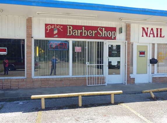 Perez Barber Shop - Houston, TX. An old-fashioned neighborhood barber shop.