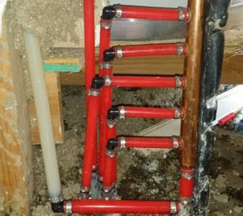 Integrity  Plumbing Company, Inc. - Oklahoma City, OK. manifold pipe in our wall