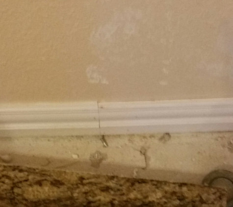 Dream Kitchen & Bath LLC - Magnolia, TX. Instalation of baseboards but jointed not cut to a 22* as should be