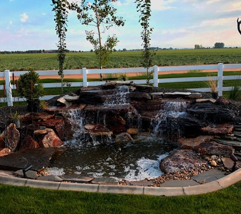 Green Blades - Nampa, ID. Outdoor Pond done by Green Blades' Landscaping Services