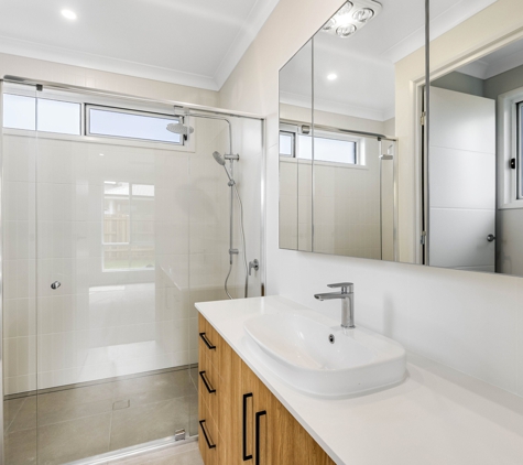 Riley Building Pty Ltd. Ensuite With Spacious Shower And Feature Subway Tiles