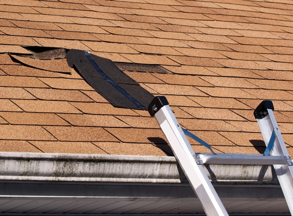 Select Roofing - Katy, TX. Damaged Shingles