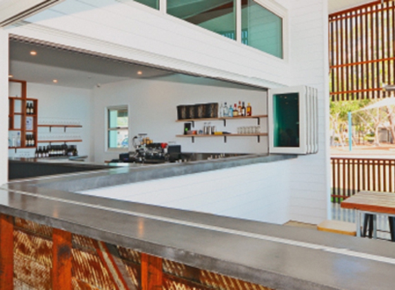 Bradnam's Windows & Doors - Kensington, QLD. White Aluminium Bi-fold Windows