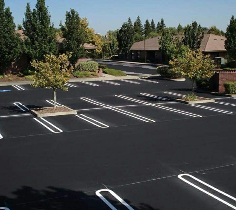 Luis Contracting corp. Sphalt paving parking lot