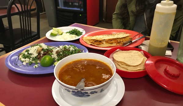 La Conasupo Restaurant and Market - Seattle, WA. Lamb Barbarcoa Tacos, Chicken quesadilla, and Consome Especial soup, plus 2 kinds of chile sauce.  Yum