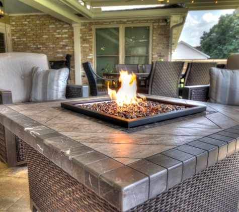 ABC Home Improvements - Baton Rouge, LA. Covered patio with a fire pit | Custom Patio Cover Arbor in Baton Rouge - www.lasunrooms.com