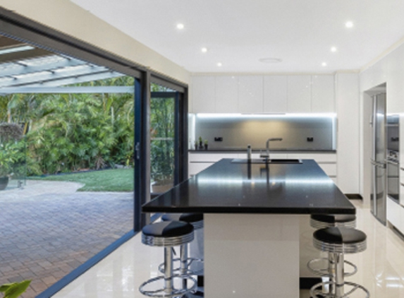 Bradnam's Windows & Doors - Boondall, QLD. Black Aluminium Bi-Fold Doors