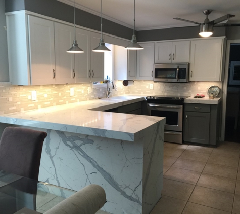 Granite Transformations of Little Rock - North Little Rock, AR. Modern and timeless update to this kitchen refaced old oak cabinets and new Quartz Marble counters, custom glass mosaic backsplash!