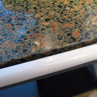 Granite Transformations - West Berlin, NJ. counters by stove.  Enlarge photo to show the chips along the edge.