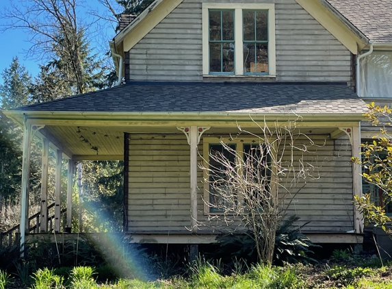 RSG Abatement & Demo Corp - Tacoma, WA. The house after asbestos siding removal, now on to painting!