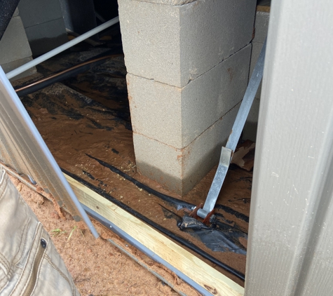 Oak Creek Homes - Lancaster, TX. Water from leak under house after two days