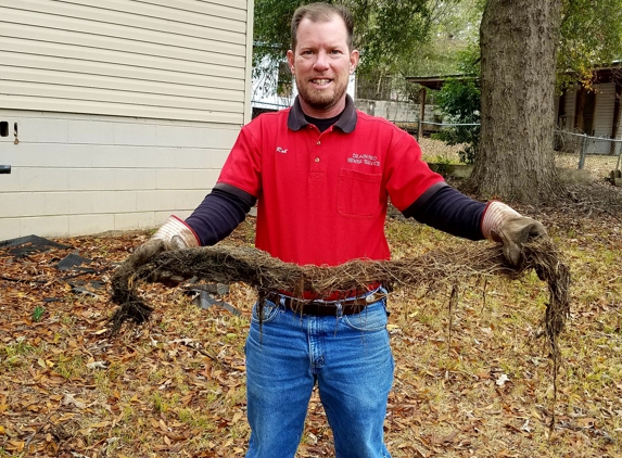 Drain Pro Sewer Service - Tuscaloosa, AL. Massive tree roots growing in a sewer line pipe