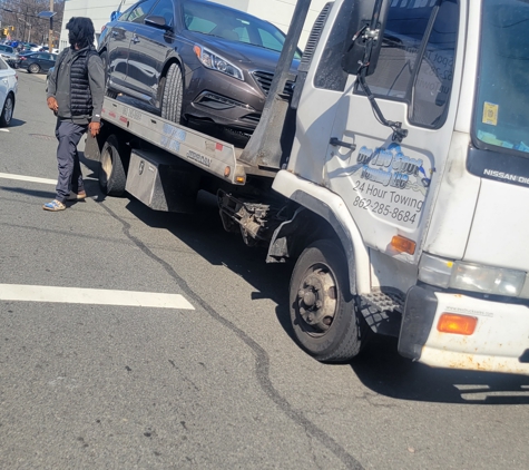 On The Spot Towing LLC - West Orange, NJ. 24hr flatbed towing services