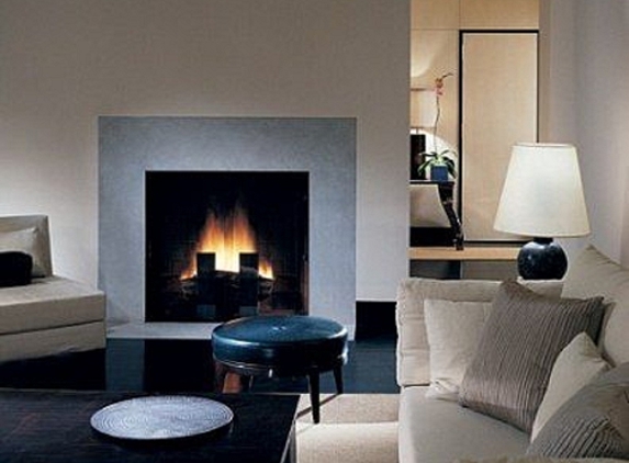 Manhattan Fireplace & Chimney - New York, NY. Chimney and Fireplace Specialist. Custom Fireplaces Built and Restored. Chimney Sweeping and Fireplace Cleaning in New York City