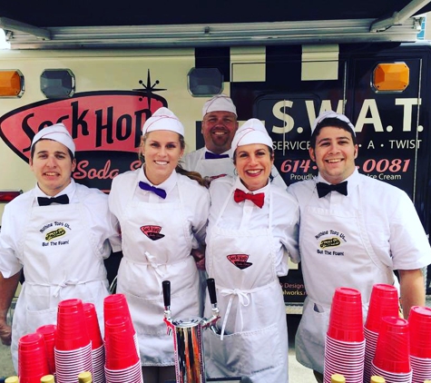 Sock Hop Soda Shop. We dress in soda jerk uniform, play 50’s music on neon jukeboxes, twist hula hoop and serve up delicious hand scooped Velvet ice cream!