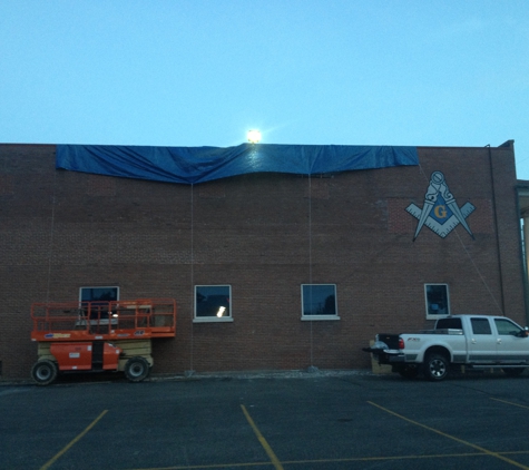 Knauss Property Services - Indianapolis, IN. Masonic Lodge Masonry Restoration.  Tarped open work to protect from weather.