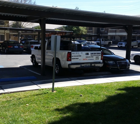 South Valley Apartments - Las Vegas, NV. Maintenance parked in covered residents parking.