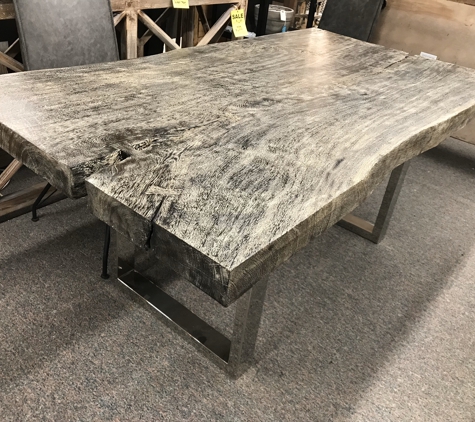 Reno Tahoe Rustic Decor - Reno, NV. Close up view of this grey stone slab table with silver legs.slab tables at