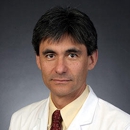 Carlos H Becerra, MD - Physicians & Surgeons