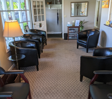 Harrison Family Dentists - Saratoga Springs, NY. Well-aired and well lit waiting area at Harrison Family Dentists Saratoga Springs NY