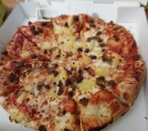 Hungry Howie's Pizza - Naples, FL. I got a Hawaiian pizza but instead if ham I got beef. It was very delicious.