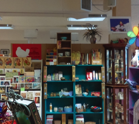 Triple Goddess Book Store - Lansing, MI. Statues, stones, incense, herbs by the scoop, Tarot and Oracle decks, Books new and used, candles, greeting cards, jewelry, pendulums & oils