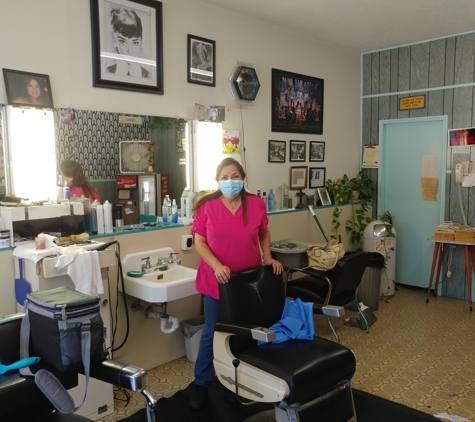 Perez Barber Shop - Houston, TX. Doris at the Perez Barber Shop, in business since 1961.
