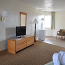 Roomba Inn & Suites - Motels