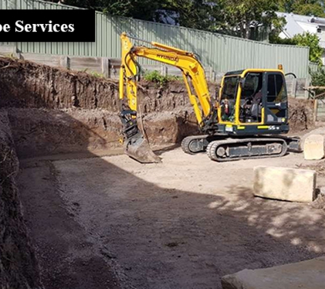 Stan Davies Excavations - Glendale, NSW. Backhoe Services